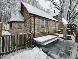 Holiday house covered in snow